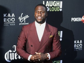 FILE - In this Aug. 3, 2017, file photo, Kevin Hart poses at Kevin Hart's "Laugh Out Loud" new streaming video network launch event at the Goldstein Residence in Beverly Hills, Calif. Hart pledged $25,000 to Hurricane Harvey relief efforts Sunday, Aug. 27, 2017, and called on fellow celebrities to do the same. (Photo by Danny Moloshok/Invision/AP, File)
