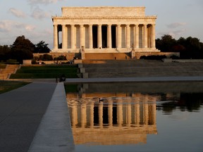 FILE - In this June 30, 2017, file photo, the Lincoln Memorial is seen in the early morning light on the National Mall. The National Park Service says someone defaced the memorial with an anti-law message early in the morning on Aug. 15, 2017. (AP Photo/Carolyn Kaster, File)