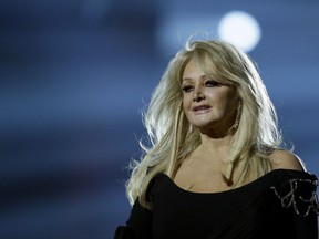 FILE - In this May 17, 2013, file photo, Bonnie Tyler performs her song "Believe in Me" during a rehearsal for the final of the Eurovision Song Contest at the Malmo Arena in Malmo, Sweden. Royal Caribbean announced on Aug. 16, 2017, that Tyler will perform her hit "Total Eclipse of the Heart" at sea on the day of the total eclipse Monday during a "Total Eclipse Cruise." (AP Photo/Alastair Grant, File)