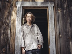 FILE - In this July 29, 2015 file photo, Chris Cornell poses for a portrait to promote his latest album, "Higher Truth," during a music video shoot in Agoura Hills, Calif. Cornell's widow told The Seattle Times for a story published Aug. 9, 2017, that she has commissioned a statue of the late Soundgarden frontman to be placed in his home town of Seattle. (Photo by Casey Curry/Invision/AP, File)