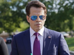 In this July 25, 2017, file photo, then-White House communications director Anthony Scaramucci walks back to the West Wing of the White House in Washington.