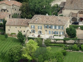 FILE - This May 31, 2008 file photo, shows the Miraval property in Correns, near Brignoles, southern France, Saturday, May 31, 2008. A French lighting designer has won a $600,000 court ruling in a dispute with Brad Pitt over a grandiose re-design of his and Angelina Jolie's chateau in Provence. Designer Odile Soudant says her business went under because of Pitt's refusal to pay for costly architectural reveries, and she is now fighting for intellectual property rights over the Chateau Miraval's lighting design. (AP Photo/Lionel Cironneau, File)