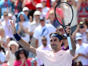 Roger Federer celebrates his win over Peter Polansky at the Rogers Cup on Aug. 9.