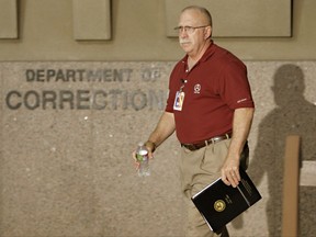 FILE--In this Aug. 19, 2010, file photo, Arizona Dept. of Corrections Director Charles Ryan arrives at a news conference at the Arizona Department of Corrections in Phoenix, Ariz. Ryan was grilled by a Phoenix judge Tuesday, Aug. 8, 2017, over whether he tried to undermine a court order that prohibited retaliation against inmates who participated in a class-action lawsuit over the quality of health care in the state's prisons. (AP Photo/Matt York, file)