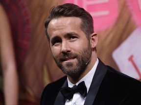 FILE--In this Feb. 3, 2017, file photo, actor Ryan Reynolds is shown during a roast at Harvard University in Cambridge, Mass. A U.S. judge is striking down a Utah law that landed a movie theater in trouble for serving alcohol during a showing of superhero film "Deadpool." Deadpool star Reynolds donated $5,000 to help pay the theater's legal bills. (AP Photo/Charles Krupa, file)