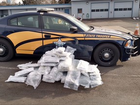 This undated photo provided by the Oregon State Police shows 113 pounds of high-quality marijuana found in the trunk of a Minnesota man's car after he was stopped for speeding in Bly, Ore., in Feb., 2017. Two reports say Oregon is an epicenter of marijuana production, with cannabis being smuggled across the USA. Oregon and other legalized states are trying to curtail this diversion into the black market, as the federal government considers more aggressive enforcement in those states. (Oregon State Police via AP)