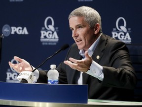 PGA Tour Commissioner Jay Monahan speaks during a news conference at the PGA Championship golf tournament at the Quail Hollow Club Tuesday, Aug. 8, 2017, in Charlotte, N.C. (AP Photo/Chris Carlson)