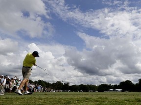 Jordan Spieth hits to the 17th green during a practice round at the PGA Championship golf tournament at the Quail Hollow Club Tuesday, Aug. 8, 2017, in Charlotte, N.C. (AP Photo/Chris Carlson)