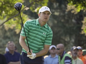 Jordan Spieth watches his tee shot on the 11th hole during the first round of the PGA Championship golf tournament at the Quail Hollow Club Thursday, Aug. 10, 2017, in Charlotte, N.C.