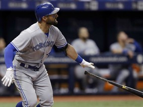 Kevin Pillar of the Toronto Blue Jays watches the flight of his game-winning homerun in the eighth inning of Wednesday's MLB game against the Tampa Bay Rays in  Tampa. The Jays tied a franchise record with six homers in a 7-6 victory.