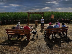 Sister George Ann Biskan leads a group of nuns and supporters during a prayer service in a chapel in a cornfield in Pennsylvania's Lancaster County. The chapel was built there as part of a protest against a pipeline.