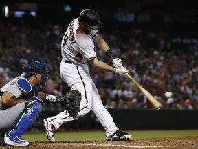 Arizona Diamondbacks' Paul Goldschmidt connects for a two-run home run against the Los Angeles Dodgers during the first inning of a baseball game Wednesday, Aug. 30, 2017, in Phoenix. (AP Photo/Ross D. Franklin)