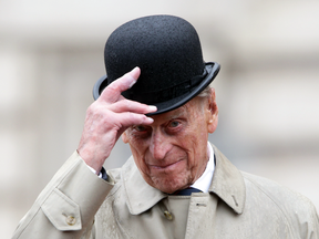 Prince Philip, the 96-year-old husband of Queen Elizabeth II, conducts his final solo public engagement on Aug. 2, 2017, overseeing a military parade in the pouring rain.