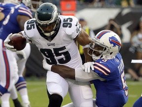 Philadelphia Eagles' Mychal Kendricks (95) is tackled by Buffalo Bills' Tyrod Taylor (5) after an interception during the first half of an NFL preseason football game, Thursday, Aug. 17, 2017, in Philadelphia. (AP Photo/Matt Rourke)