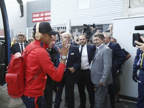 Paris Saint-Germain's Neymar gets off the team bus ahead of his League One soccer match against Guingamp at the Roudourou stadium in Guingamp, western France, Sunday, Aug. 13, 2017. Neymar is expected to make his long-awaited debut with Paris Saint-Germain on Sunday in the small Brittany town of Guingamp. French soccer authorities finally receive the Brazil star's international transfer certificate. (AP Photo/Kamil Zihnioglu)