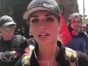 Rebel Media’s Faith Goldy in Charlottesville moments before a car rammed into a crowd of counter-protesters next to her.
