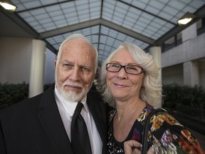 In this undated file photo, Dan and Fran Keller pose outside of the Travis County courthouse in Austin, Texas.