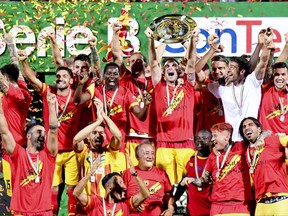 FILE - in this Thursday, June 8, 2017 file photo, Benevento players celebrate their promotion to the Serie A championship at the Vigorito stadium, in Benevento, southern Italy. A look at Spal, Hellas Verona and Benevento as the promoted teams prepare for this weekend's opening of the Italian league season. (Ciro Fusco/ANSA via AP)