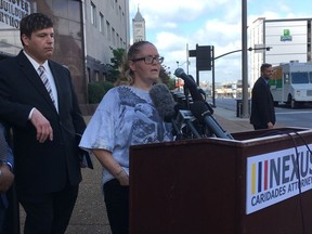 Christel Ward speaks at a news conference Thursday, Aug. 17, 2017, outside of the federal courthouse in Nashville, Tenn., about a lawsuit filed on her behalf over a program that awarded 30-day jail sentence reductions to inmates who underwent vasectomies or birth control implants. Ward says she underwent the implant and never was awarded the time off. The lawsuit says the policy amounted to eugenics. (AP Photo/Jonathan Mattise)