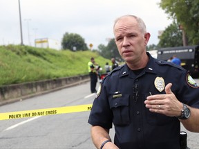 Little Rock Police Lt. Steve McClanahan speaks Monday, Aug. 14, 2017, near an interstate highway in Little Rock, Ark., about the city's increasing number of homicides. The city on Monday matched its homicide total from 2016 and is on a pace to approach the pace from 1993, when gang warfare led to a spike in the city's murder rate. (AP Photo/Kelly P. Kissel)
