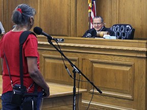 In this Aug. 10, 2017 photo, Providence Municipal Court Judge Frank Caprio listens to a case, where he dismissed a parking ticket, during a court session in Providence, Rhode Island. The 80-year-old judge has become a viral video sensation with hundreds of millions of views of clips from his court proceedings, making him a star to fans around the world.  (AP Photo/Michelle R. Smith)