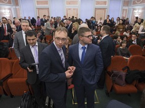 Members of Jehovah's Witnesses wait in a court room in Moscow, Russia, on Thursday, April 20, 2017.  Russia's Supreme Court has banned the Jehovah's Witnesses from operating in the country, accepting a request from the justice ministry that the religious organisation be considered an extremist group, ordering closure of the group's Russia headquarters and its 395 local chapters, as well as the seizure of its property.