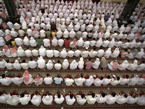 In this March. 26, 2008 file photo, Saudi Shiites pray in Qatif, Saudi Arabia. The kingdom's new crown prince hopes to transform the kingdom and modernize society, but the planned execution of 14 Shiite protesters charged with violence against security forces suggests the handling of sectarian tensions and unrest remains unchanged. (AP Photo, File)