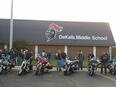 A group of bikers escorted Phil Mick to school in DeKalb, Indiana.