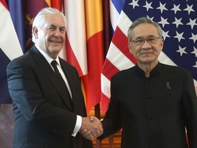 U.S. Secretary of State Rex Tillerson, left, and Thai Foreign Minister Don Pramudwinai pose for a photograph during meeting at the Foreign Ministry in Bangkok, Thailand, Tuesday, Aug. 8, 2017. (AP Photo/Sakchai Lalit)