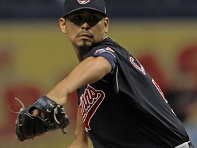 Cleveland Indians starter Carlos Carrasco pitches against the Tampa Bay Rays during the first inning of a baseball game Friday, Aug. 11, 2017, in St. Petersburg, Fla. (AP Photo/Steve Nesius)