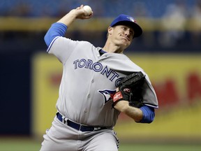 Toronto Blue Jays' Tom Koehler pitches to the Tampa Bay Rays during the first inning of a baseball game Thursday, Aug. 24, 2017, in St. Petersburg, Fla. (AP Photo/Chris O'Meara)