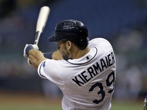 Tampa Bay Rays' Kevin Kiermaier flies out against Seattle Mariners pitcher Erasmo Ramirez during the first inning of a baseball game Friday, Aug. 18, 2017, in St. Petersburg, Fla. Kiermaier is playing in his first game since coming off the disabled list. (AP Photo/Chris O'Meara)