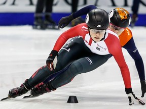 In this Nov. 6, 2016 file photo, Kim Boutin races at the ISU World Cup in Calgary.