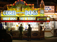 Fairgoers buy food at the Iowa State Fair in Des Moines. The fair runs to Aug. 19 and is expected to draw about one million people.