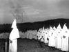 Ku Klux Klan members at a cross burning ceremony on top of Stone Mountain in 1948.