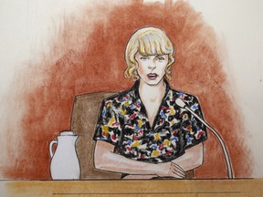 In this courtroom sketch, pop singer Taylor Swift speaks from the witness stand during a trial Thursday, Aug. 10, 2017, in Denver