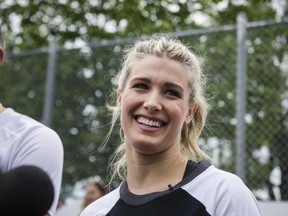 In this July 26 file photo, Eugenie Bouchard speaks to reporters at a promotional event in Toronto ahead of the Rogers Cup.