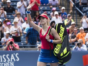 Eugenie Bouchard of Canada leaves the court after being defeated by Donna Vekic of Croatia during their first-round match at the Rogers Cup women's tennis tournament in Toronto, Tuesday, August 8, 2017.