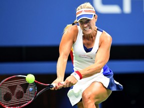 Angelique Kerber returns the ball to Naomi Osaka at the U.S. Open on Aug. 29.