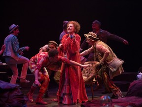 Seana McKenna (centre) as Aurélie, the madwoman of Chaillot, with members of the company.