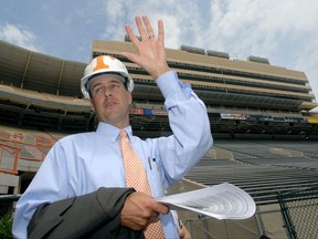 FILE - In this June 2006 file photo, John Currie leads a media tour of renovations at Neyland Stadium in 2006, when he was senior associate athletic director in Knoxville, Tenn. Tennessee AD Currie looks to boost Vols' all-sports standing. Tennessee athletic director John Currie understands the challenge facing him as he enters the first full school year in his new job. The Volunteers were 46th in the most recent Directors' Cup all-sports standings. That's their lowest finish since the award originated in 1993-94. Tennessee has ranked no better than 33rd each of the last six years.(Clay Owen/Knoxville News Sentinel via AP, File)