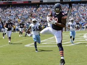 Chicago Bears tight end Dion Sims (88) catches a 1-yard touchdown pass against the Tennessee Titans in the first half of an NFL football preseason game Sunday, Aug. 27, 2017, in Nashville, Tenn. (AP Photo/Mark Zaleski)