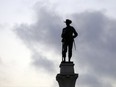 S Confederate Soldier Statue stands tall on the Texas Brigade monument on the east side of the Texas State Capitol in Austin, Texas.