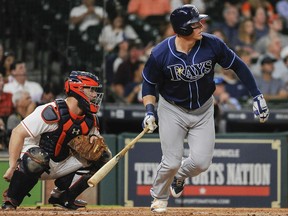 Tampa Bay Rays' Logan Morrison watches his double during the third inning of a baseball game against the Houston Astros, Thursday, Aug. 3, 2017, in Houston. (AP Photo/Eric Christian Smith)
