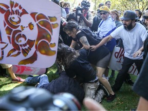 Rightwing No-To-Marxism rally attendees and counter protesters clash on August 27, 2017 at Martin Luther King Jr. Park in Berkeley, California.