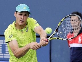 J.C. Aragone returns a shot against Kevin Anderson at the U.S. Open on Aug. 28.