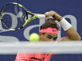 Rafael Nadal, of Spain, returns a shot from Dusan Lajovic, of Serbia, during the first round of the U.S. Open tennis tournament, Tuesday, Aug. 29, 2017, in New York. (AP Photo/Frank Franklin II)