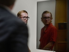 Defendant Tyerell Joe Przybycien glances back into the courtroom as he exits for a break during his preliminary hearing in 4th District Court, Provo, Utah on Wednesday, August 23, 2017. Przybycien was charged with murder after prosecutors say he filmed a teenage girl killing herself using a rope he bought for her. (Scott Sommerdorf/The Salt Lake Tribune via AP)