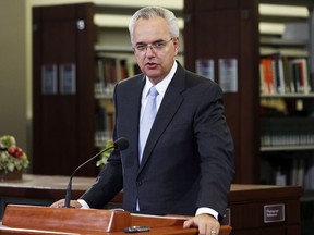 Elder James J. Hamula speaks during a preview of a new exhibit featuring some early documents of The Church of Jesus Christ of Latter-day Saints in Salt Lake City, Wednesday, Sept. 3, 2014.