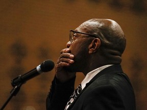 In this Sunday, Aug. 27, 2017 photo, Don Gathers voices his concerns in the Martin Luther King Jr. Performing Arts Center during a community meeting organized by the Department of Justice's Community Relations Service in Charlottesville, Va. Charlottesville residents told city leaders at an emotional community meeting they were traumatized by a white nationalist rally and dissatisfied with the way officials handled the event and the violence that unfolded. (Zack Wajsgras/The Daily Progress/The Daily Progress via AP)